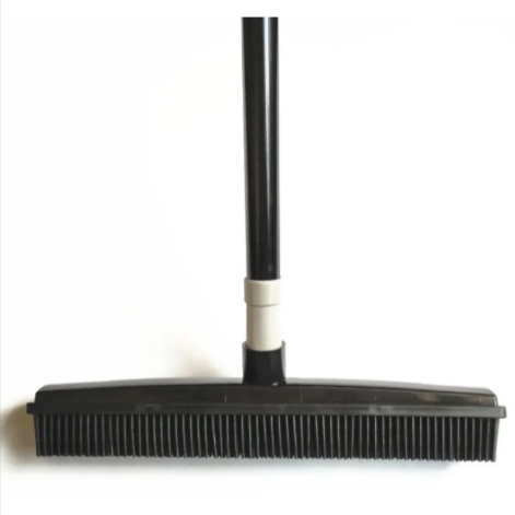Rubber Pet Hair Broom & Carpet Rake in use