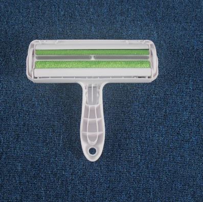 Compact Pet Hair Lint Remover in use