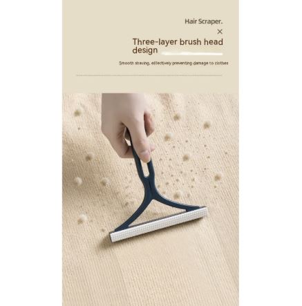 Reusable Fabric & Pet Hair Scraper in use